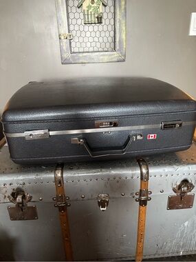 American Tourister Hard-Shell Suitcase with Combination Lock